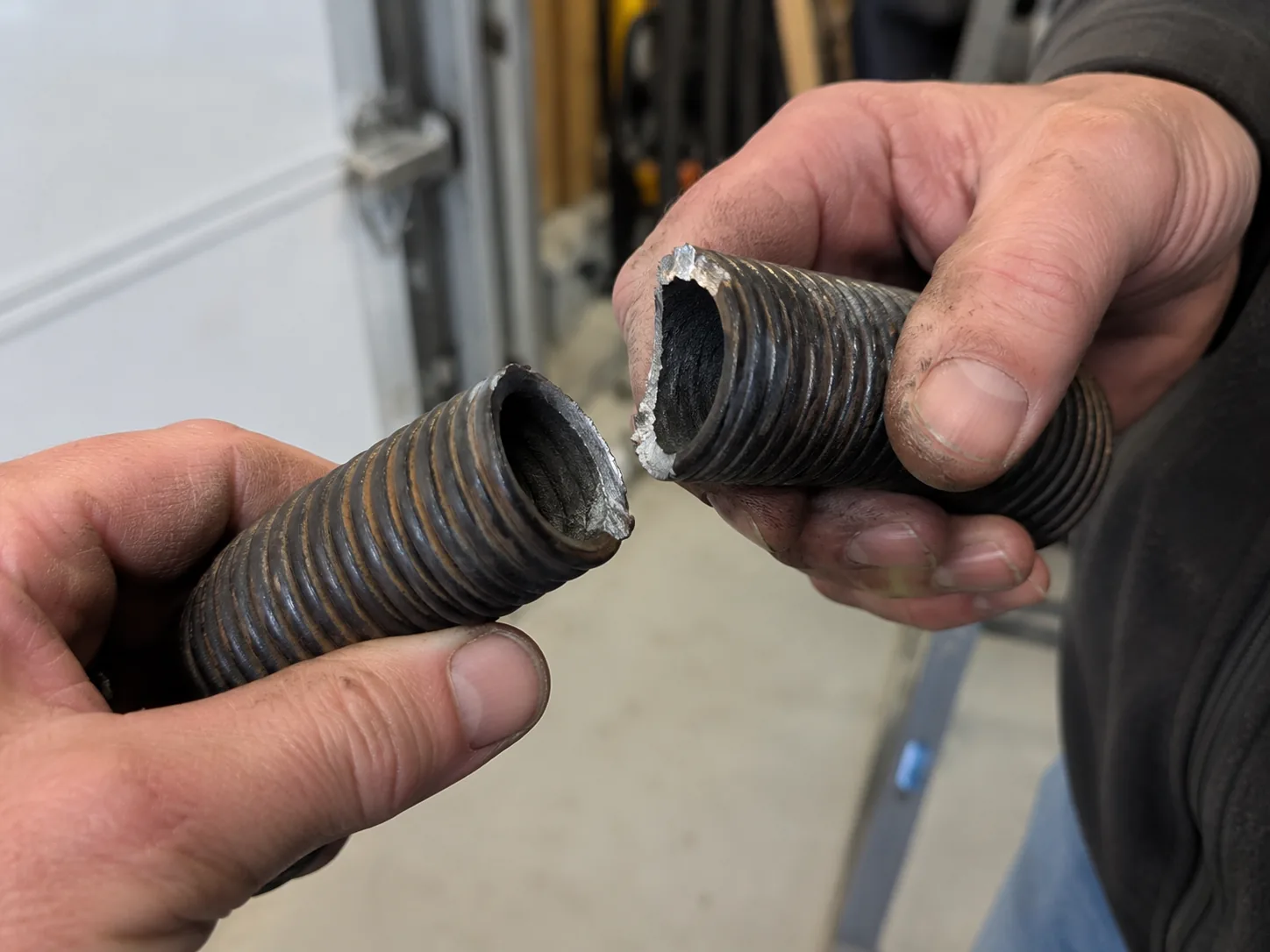 Spring Repair for The Pinery's Newer Garage Doors in Aurora
